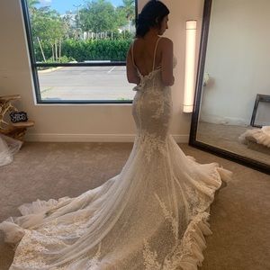 Brand new never tailored. Nicole milano dress 6,900.00 brand new